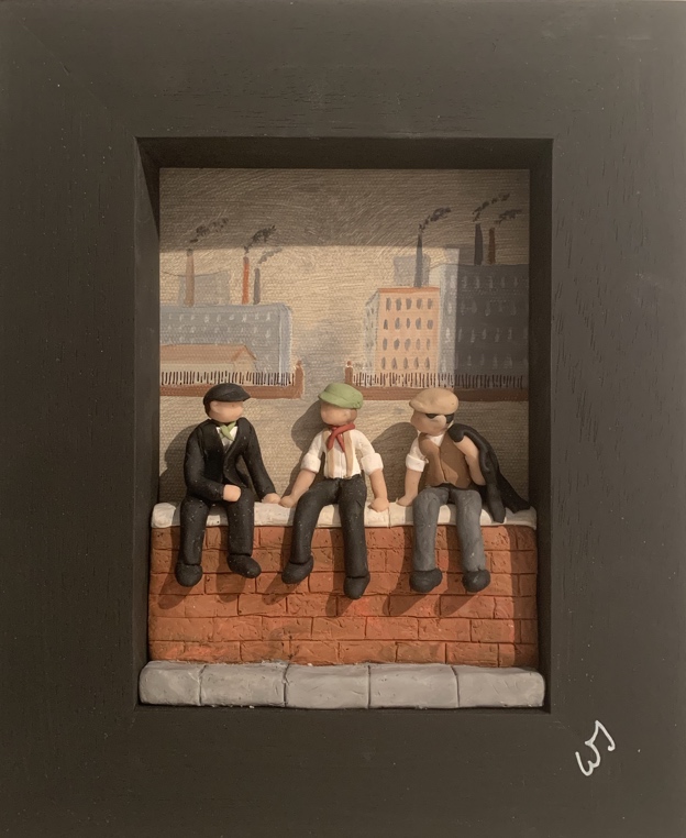 Men on wall with black frame